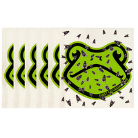 A set of six green and black frog-shaped sticky window fly traps with flies stuck to them, designed for pest control.