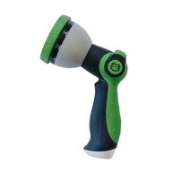 Green and black garden hose nozzle on a white background