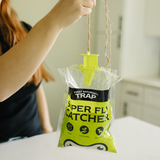 Super Fly Catcher trap with a person holding it.